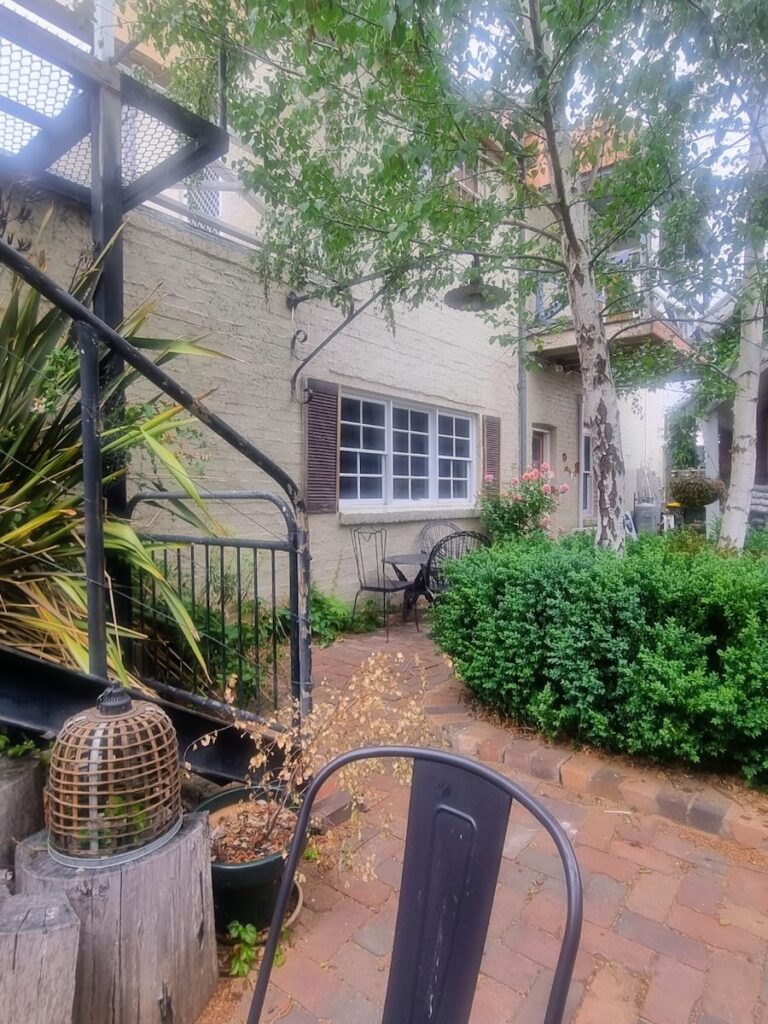 Backyard seating area of The Courtyard Coffee Shop in Cooma