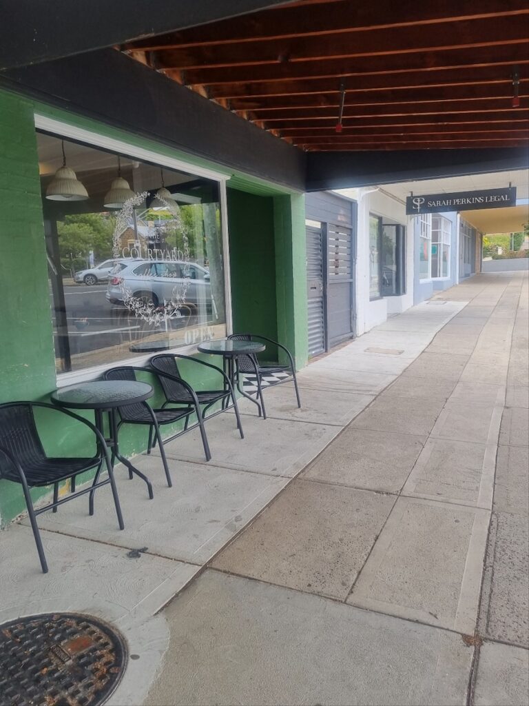 Entrance of The Courtyard Coffee Shop in Cooma with outdoor seating