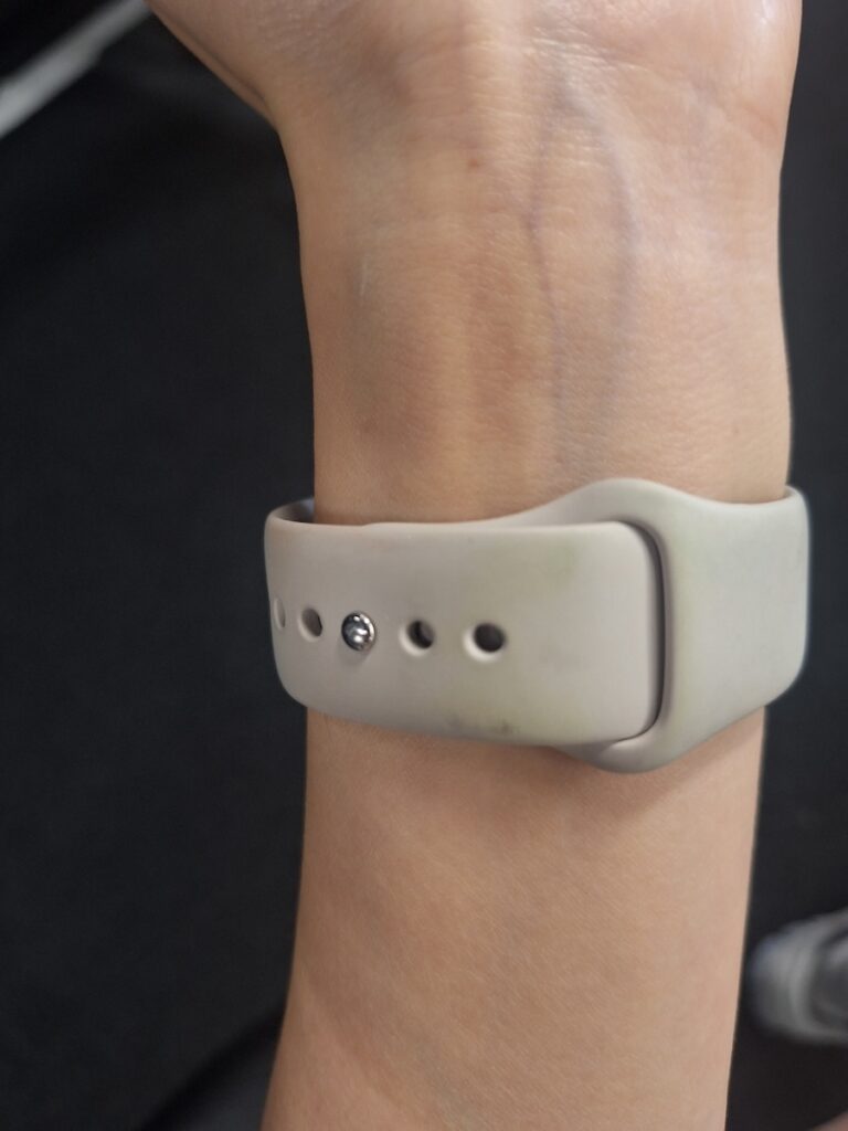 Apple silicone band with green stain