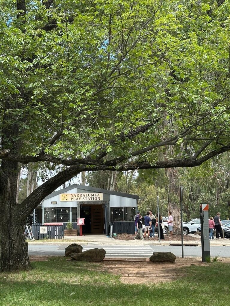 Yarralumla Play Station entrance near Weston Park in Canberra surrounded by large trees